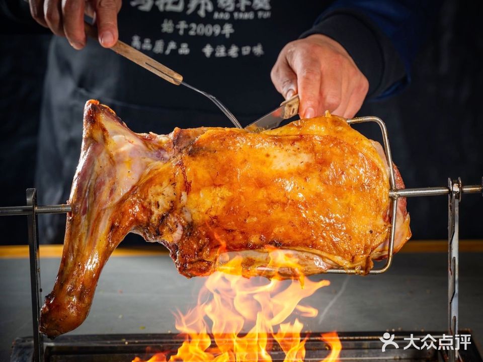 老安松·乌托邦烤羊腿烤羊排烧烤海鲜烤全羊(中央大街店)
